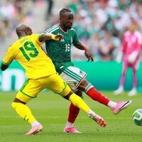 Mexico kick off World Cup with 2-0 win over 9-man South Africa