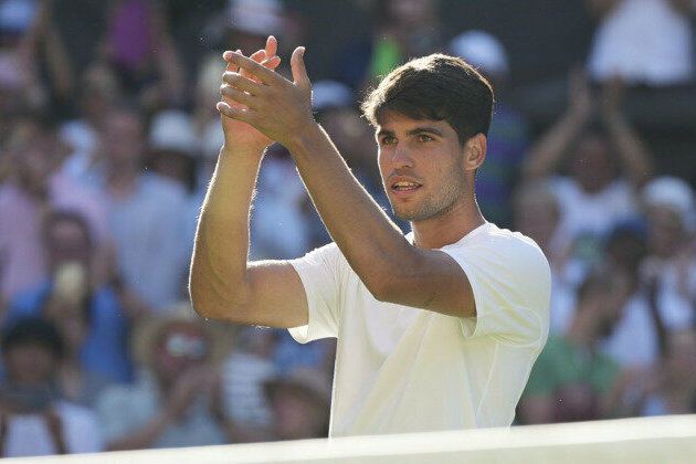 Defending champion Alcaraz labors to first round victory at Wimbledon