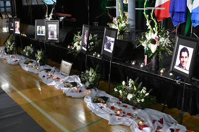  hotos of the victims are seen in front of the stage before the start of a memorial service for the krainian irlines flight 752 who crashed in ran at the aville ommunity ports entre in dmonton anada on anuary 12 2020 hoto by alter ychnowicz  