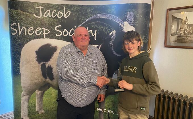 Farmer Joe receiving the Young Person on the Year award at the Pat Bromley awards presented by the Jacob Sheep Society 
