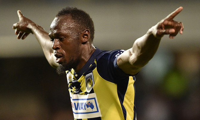 Bolt hits first goals in football bid Bolt hits first goals in football bid