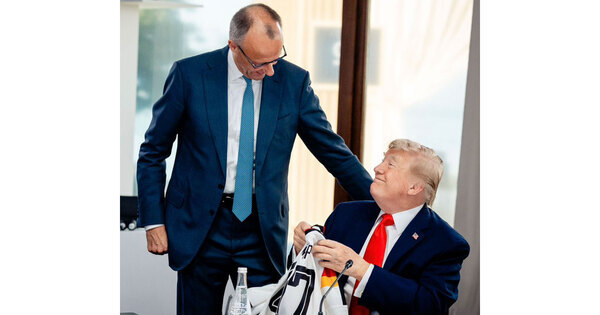 German Chancellor Friedrich Merz gifts Trump '47' Germany football jersey at G7 summit