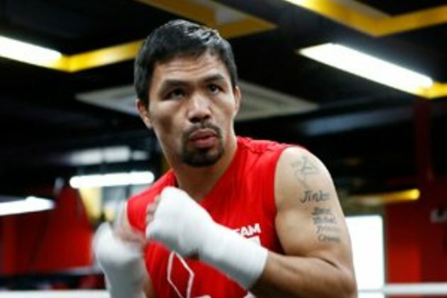 Pacquiao battling age, hungry Thurman in title showdown