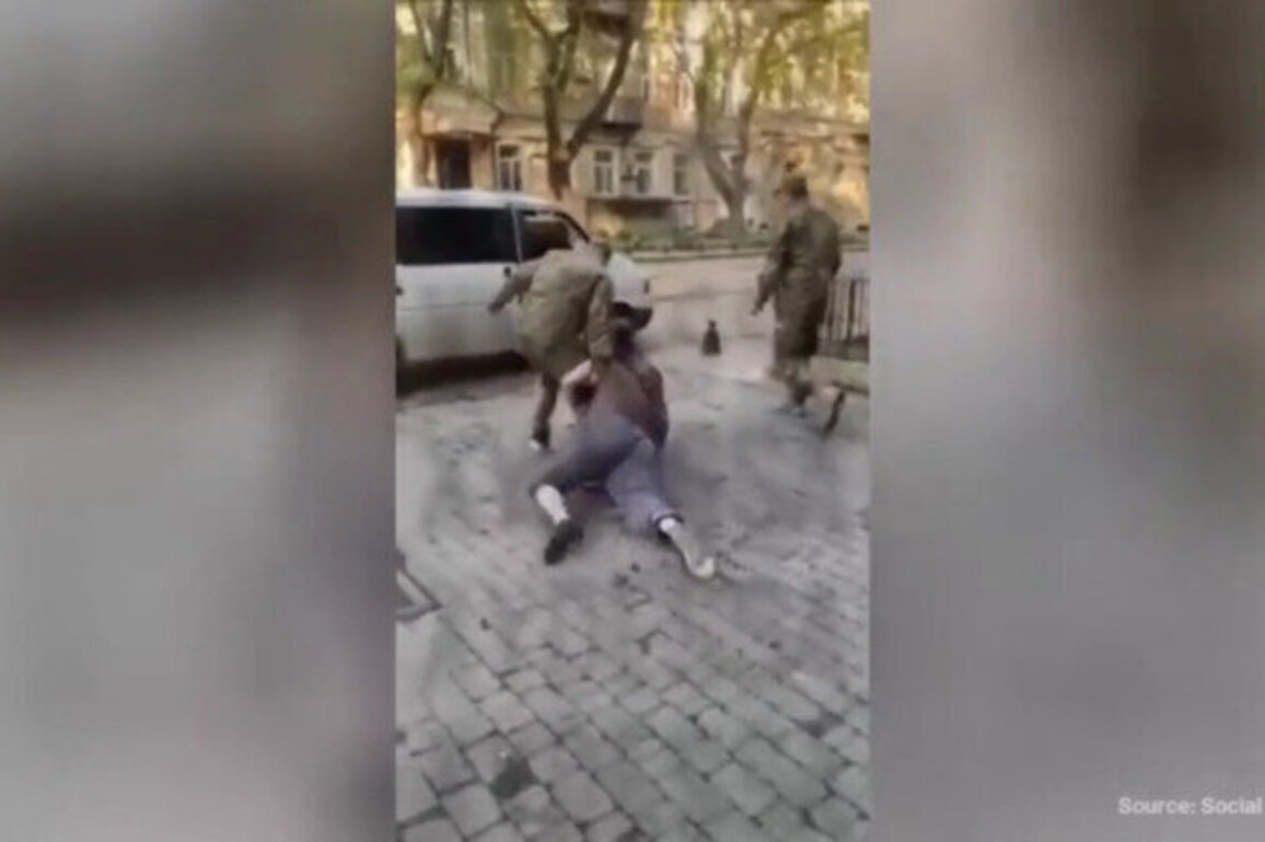 Ukrainian draft officers filmed forcibly detaining recruits 