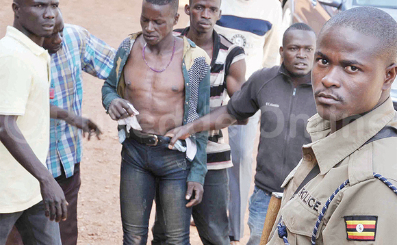 Omuvubuka agambibwa okuba omubbi wa bodaboda nga bamutwala ku poliisi. Omuvubuka agambibwa okuba omubbi wa bodaboda nga bamutwala ku poliisi.