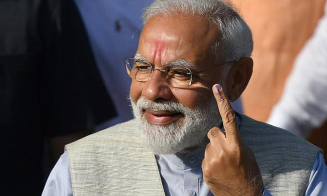 Modi casts vote on India's 'Super Tuesday' Modi casts vote on India's 'Super Tuesday'