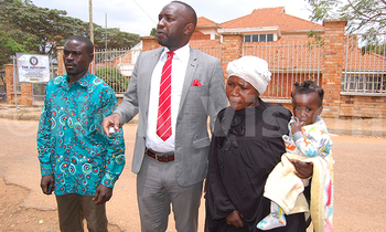 Faridah kiconco with her lawyer amon kategaya m and her husband after the meeting 350x210