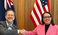 USGS director David Applegate and minister for resources and northern Australia Madeleine King signing a joint statement following a meeting on February 8, 2024, at the Australian embassy in Washington. Image supplied by Australian government.