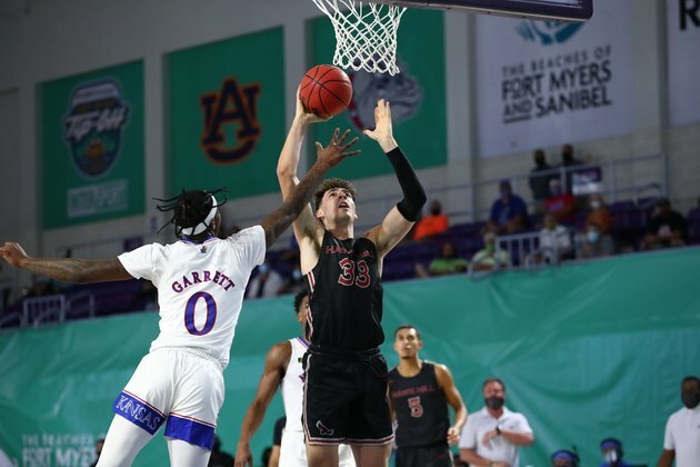 Kansas pulls away from St. Joseph's behind Braun's hot hand
