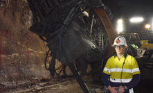 NSMS general manager Rob Parsons in front of one of its long-hole production rigs fitted with Minnovare’s Production Optimiser technology