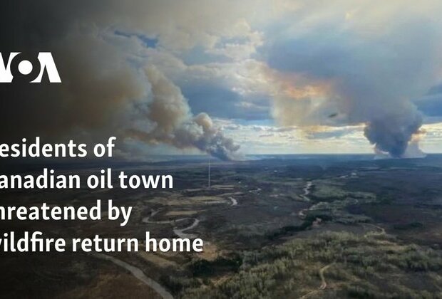 Residents of Canadian oil town threatened by wildfire return home