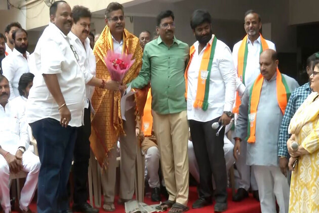 Telangana BJP President Ramchander Rao meets Madhu Park Ridge Apartments residents alleging eviction threat