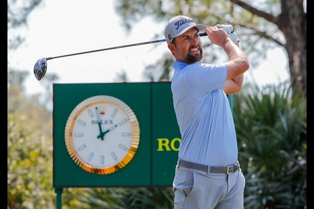 Matthew Fitzpatrick, Webb Simpson share WGC lead