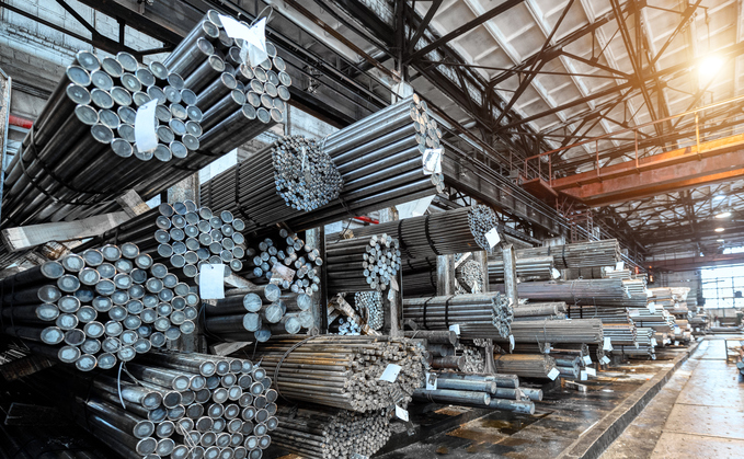 Steel bars wait in a warehouse | Credit: iStock