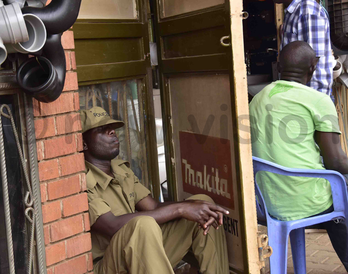   policeman takes a nap at hoprite polling station hoto by uliet ukwago