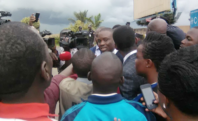 ampala ayor rias ukwago addresses the media after he was barred from accessing the airport along with other s hoto by shraf asirye