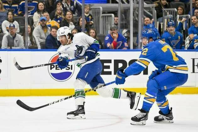 Kiefer Sherwood nets hat trick as Canucks edge Blues in shootout