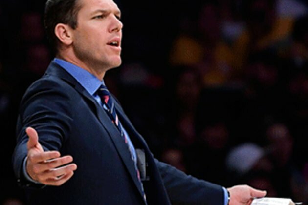 LA Lakers split with embattled head coach