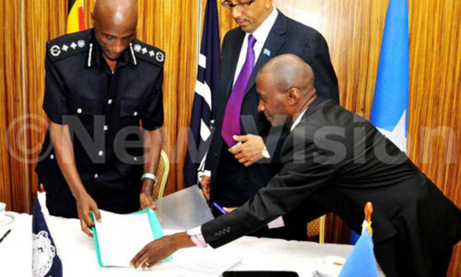 Uganda, Somali police sign MOU to counter terrorism Uganda, Somali police sign MOU to counter terrorism