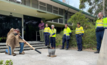 Local Traditional Owner and Whadjuk man Barry Winmar performs a Welcome to Country and smoking ceremony at Kwinana refinery.