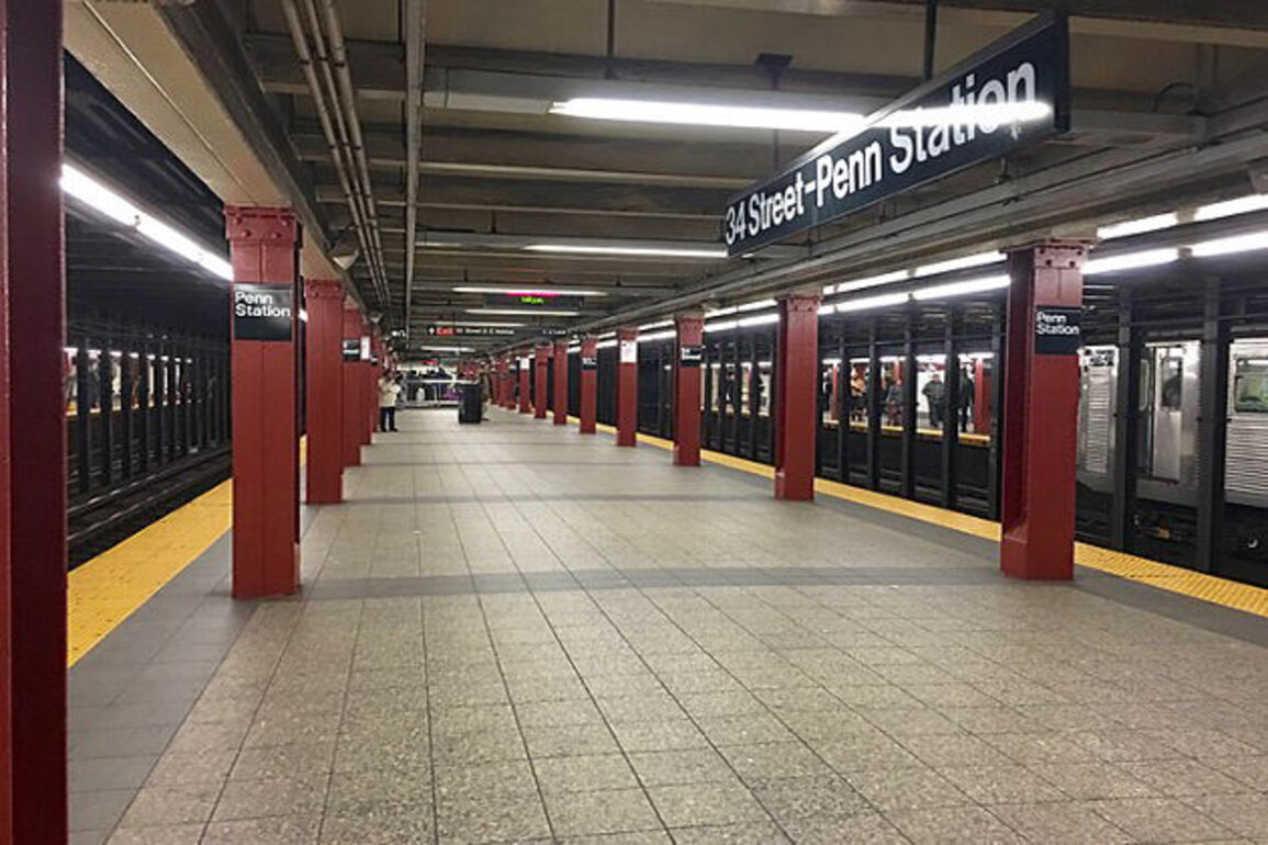 Police hunt 2 men accused of burning sleeping man near Penn Station