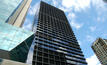 Telstra, with its Melbourne global headquarters pictured, has renewed cooperation with Komatsu