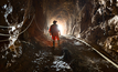 Miner inside the access tunnel of an underground gold and copper mine.