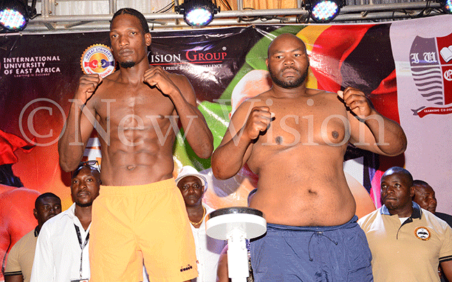  hafik iwanuka left pose with ahmsanq ube after the official weigh in at  ov 29 2019