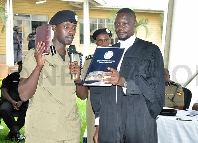  abiiti uzeyi the eputy nspector eneral of olice swears in as a member of the police council 