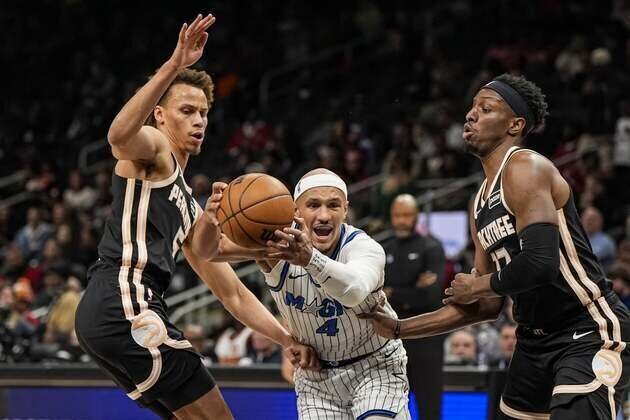 Hawks capture 10th straight win, end Magic's run at 7 games