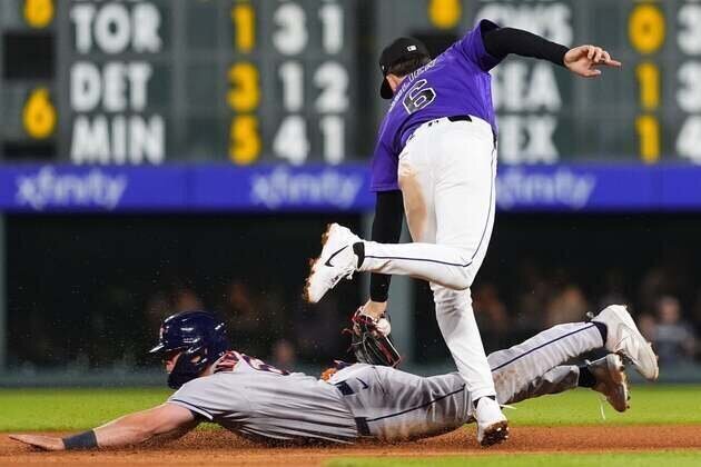 Rockies' 8-run inning just enough to down Astros