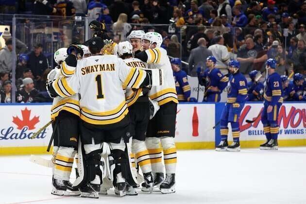 Bruins rally in 3rd, upend Sabres in OT for pivotal win