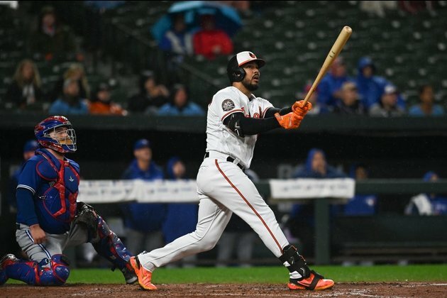 Jays down O's, close in on clinching top wild card