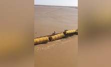  An aerial view of rail line flooding in Queensland