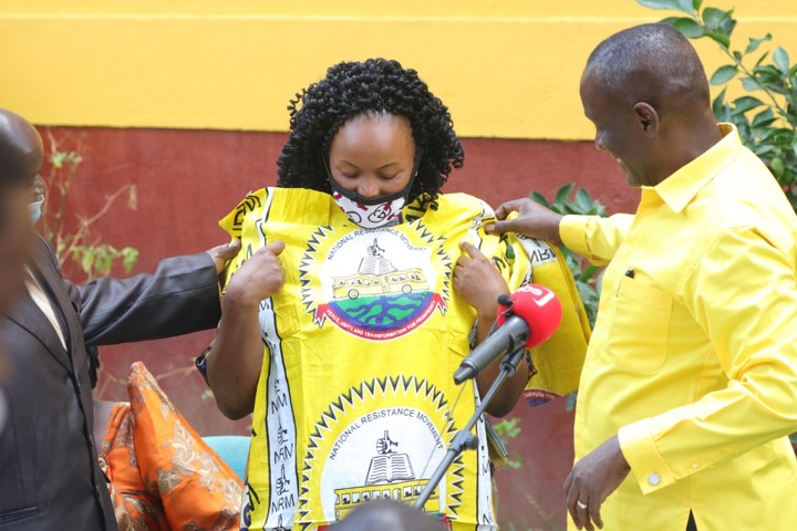 One of the defectors receiving an NRM dress