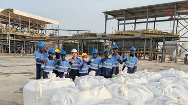 Kodal Minerals processing team with first spodumene