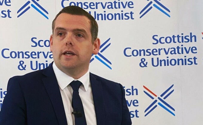 "I have served as MP, MSP and leader for over three years now and believed I could continue to do so if re-elected to Westminster, but on reflection, that is not feasible." (Douglas Ross)