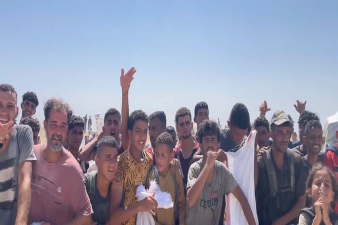 Palestinians chant "I love you Trump" as US-backed aid enters region