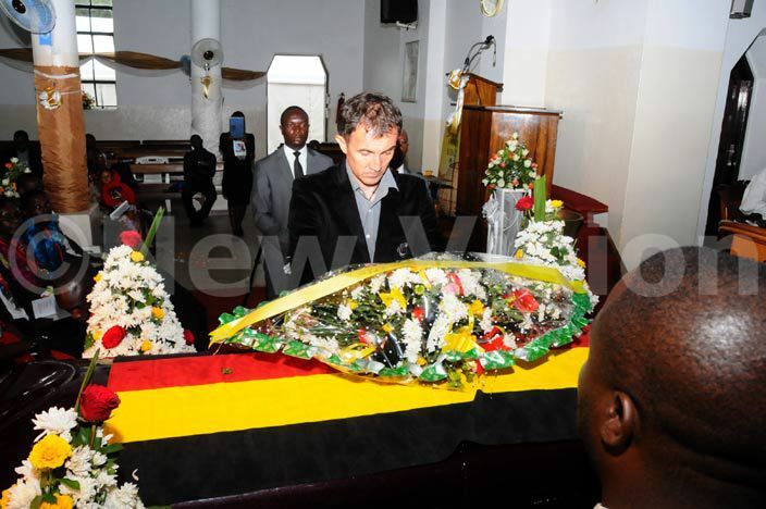  ganda ranes national coach icho redojevic lays a wreath on bel hairas casket
