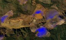 Descartes Labs applies interferometric techniques to complex SAR data to estimate surface deformation for mining areas and tailings dams. The shades of blue indicate areas that have sustained phase shifts suggesting surface deformation of up to 25cm between November of 2016 and January of 2019