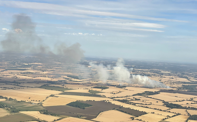 Farming field on fire during extreme heatwave in Hertfordshire in the summer 2022 heatwave | Credit: iStock