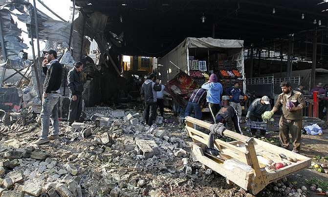 IS suicide bombing kills at least 12 at Baghdad market IS suicide bombing kills at least 12 at Baghdad market