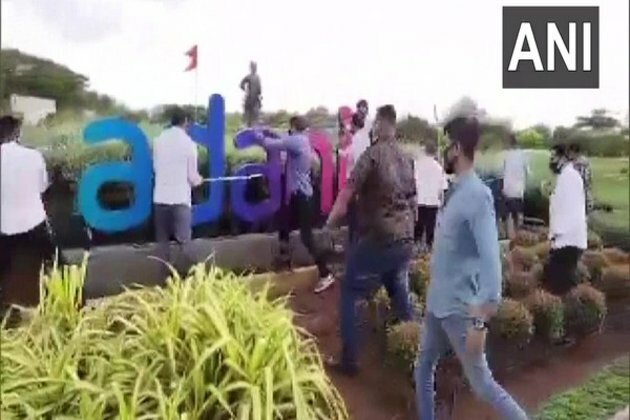 Sena workers vandalise Adani signboard at Mumbai airport
