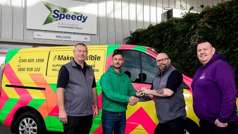 Leigh Newell and Del Cleveland hand over the keys to members of the MakeItVis team.