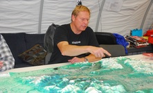 Rick Van Nieuwenhuyse navigates a model of the project area