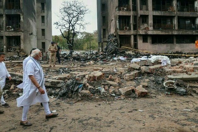 Narendra Modi visits plane crash site and meets sole survivor