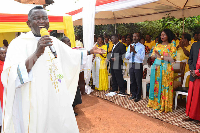  r usaala entertains hristians during the pilgrimage mass at itebi atholic hurch on hursday ebruary 21hotos by athias azinga