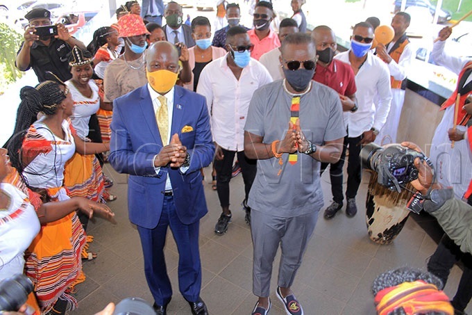 Eddy Kenzo with other tourism officials after being unveiled as Uganda's tourism ambassador by state minister minister Godfrey Kiwanda Ssuubi.