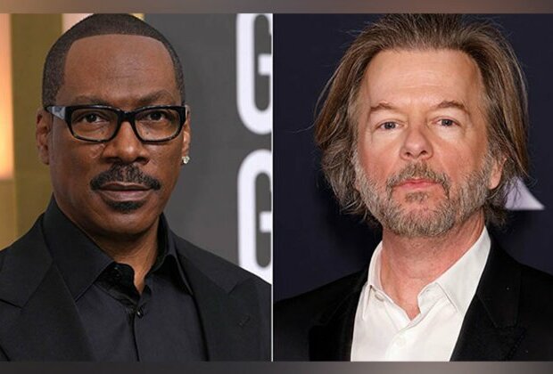 Eddie Murphy recalls "cheap" joke David Spade made about him