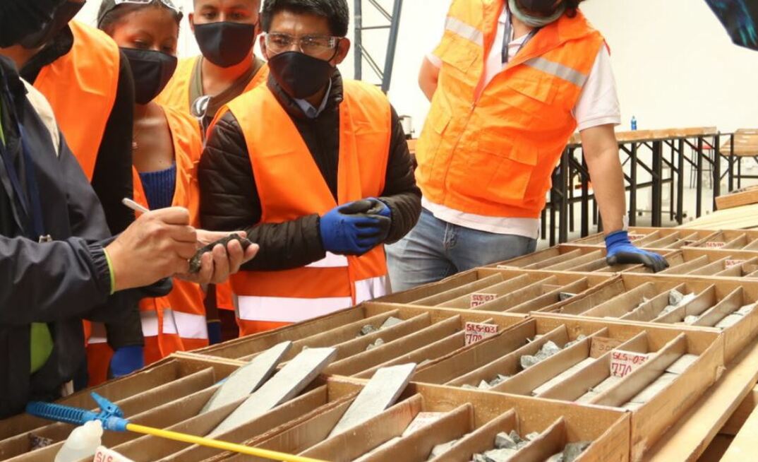 Solaris Resources geologists reviewing drill core at Warintza in Ecuador